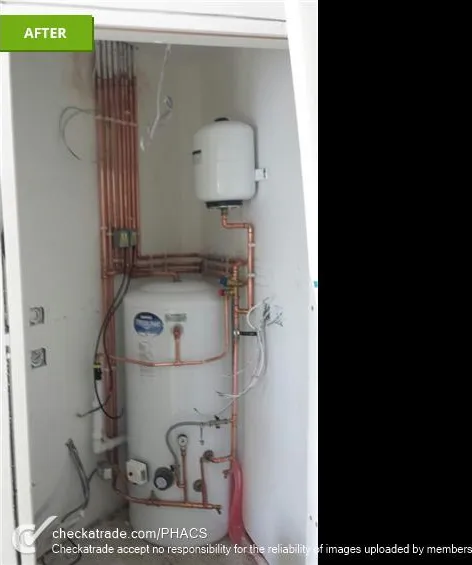 Copper pipework and a replacement hot water cylinder installed by PHACS