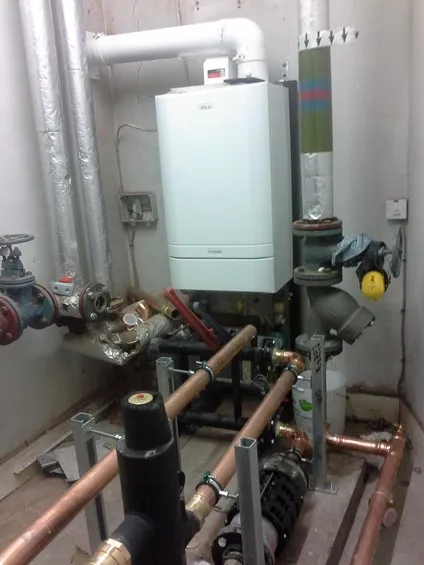Heating system pipework and pumps serviced by PHACS
