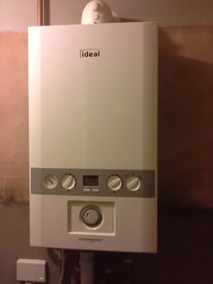 Wall-mounted gas boiler fitted by PHACS engineers